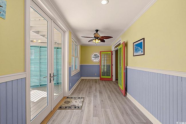 Interior space featuring a ceiling fan | Image 28