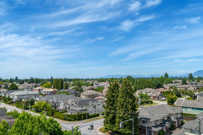 Aerial view of residential area with a mountainous background | Image 24