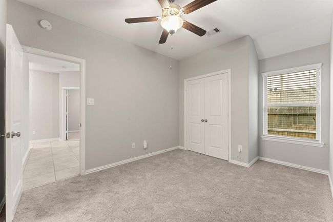 Two of two secondary bedrooms leading to flex space | Image 27