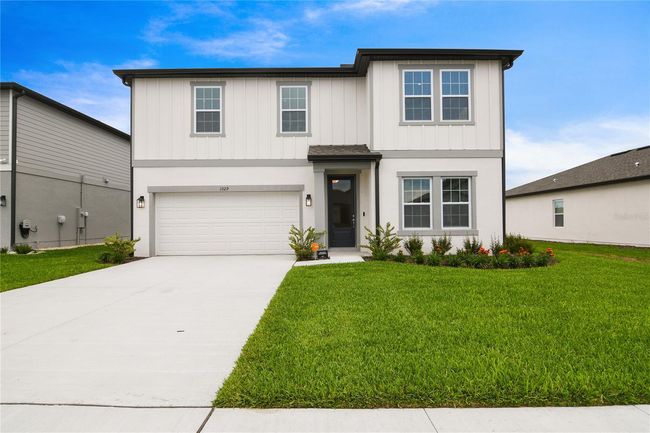 On one of the largest lots in the community this NEW HOME was just finished in 2023 and offers a light and bright open concept with LUXURY VINYL PLANK floors throughout the main living areas, 4-bedrooms, 2.5-baths, an office and loft space for room to grow! | Image 1