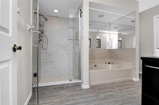 Jack & Jill Guest Bathroom comes with Tub and a walk in Shower | Image 48
