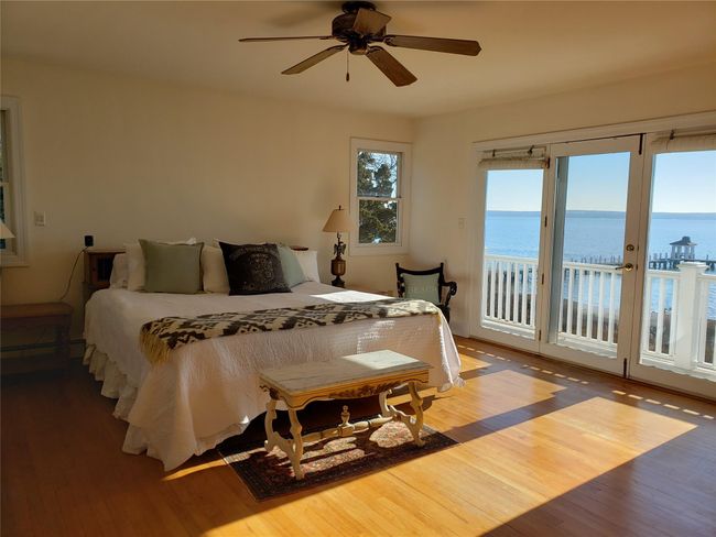 primary 2nd fl suite has magnificent waterviews, ceiling fan, balcony, bath | Image 26