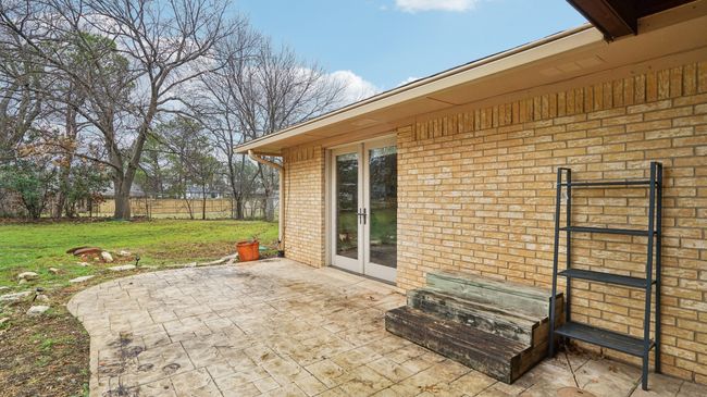 View of patio / terrace with french doors and a fenced backyard | Image 33