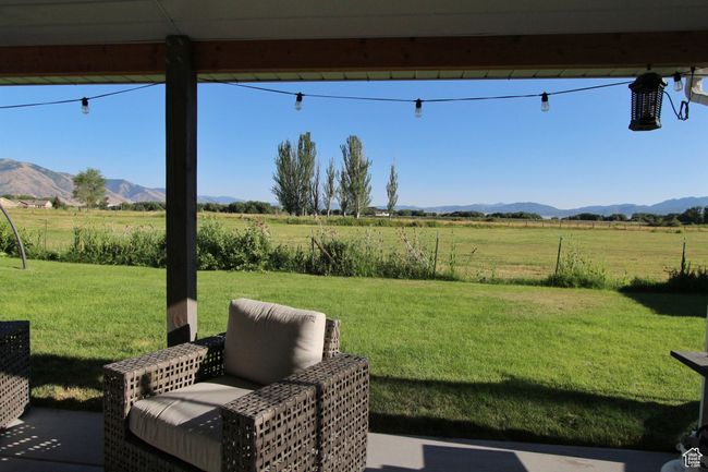 View of grassy yard with a view of countryside and a mountain view | Image 25