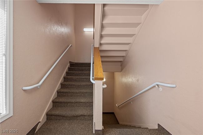 Stairway featuring carpet | Image 37