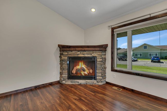 Gas fireplace with stone surround | Image 12