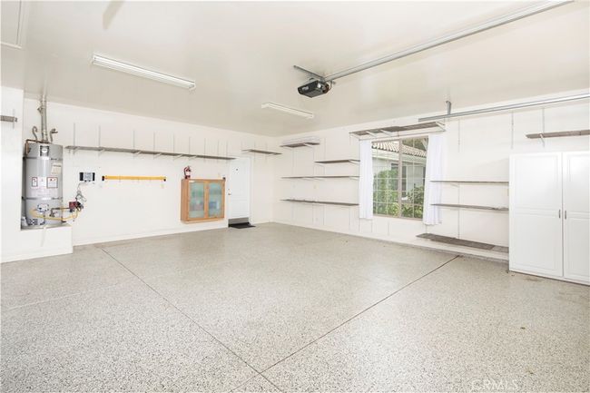 Oversized 3 car garage with faux granite floor | Image 48