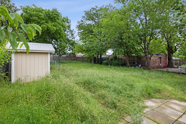 View of yard featuring a shed | Image 24