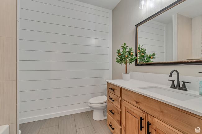 Full bathroom featuring toilet and vanity | Image 13