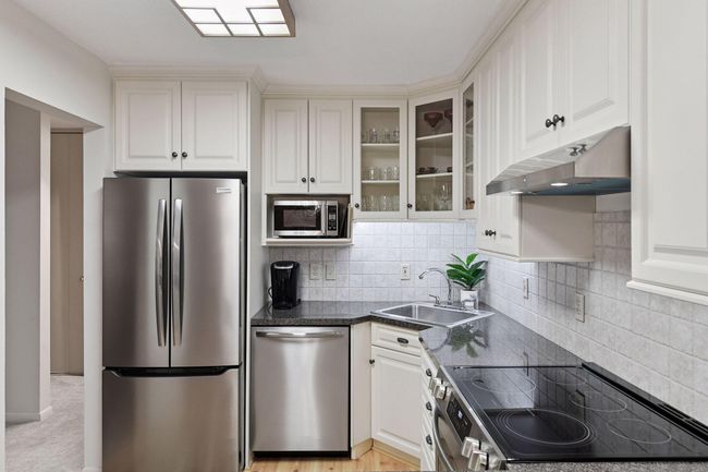 Beautiful updated kitchen. New stainless steel appliances as of April 2025. | Image 8