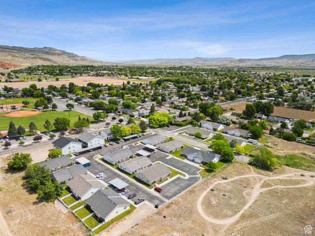 Aerial view of residential area with a mountain backdrop | Image 26