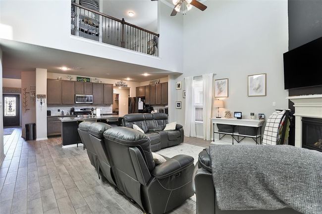 A beautifully captured photo that showcases the seamless flow throughout the entire home. | Image 12