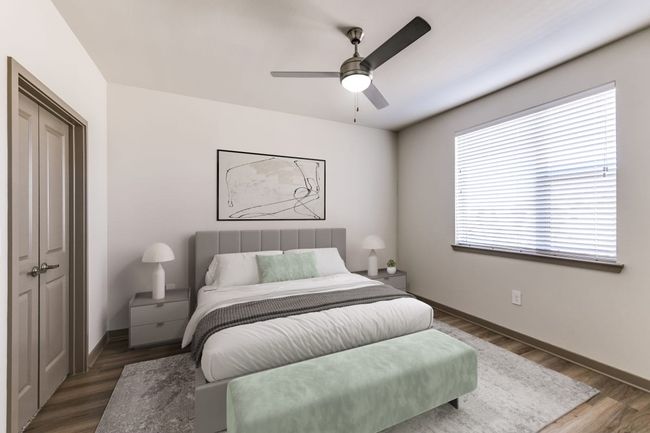Bedroom with dark wood-type flooring and ceiling fan | Image 15
