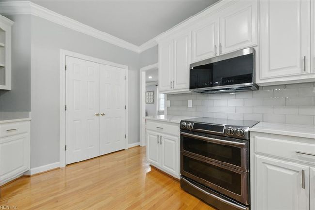 Alternate view of the Kitchen looking towards the Formal Dining Room... | Image 11