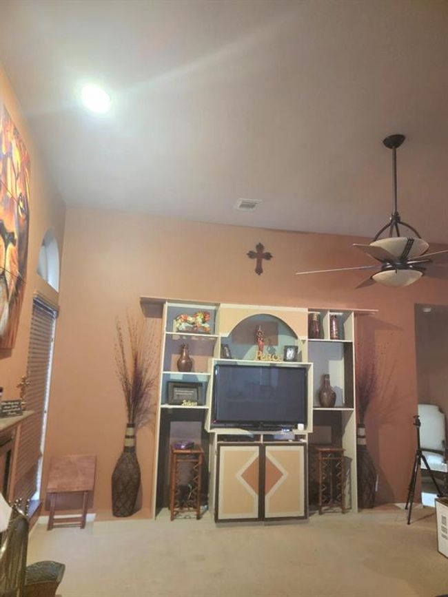 Forcal point in livingroom is Built-in entertainment center | Image 4