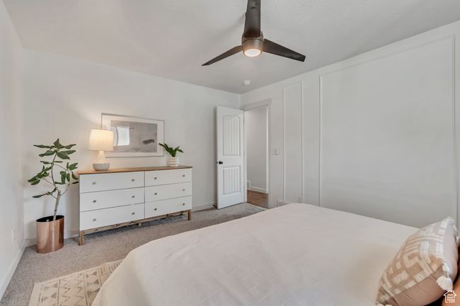Bedroom featuring carpet flooring and a ceiling fan | Image 12