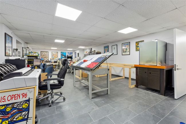 Office featuring a drop ceiling | Image 26