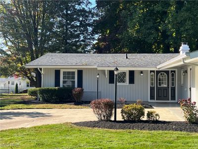 View of front of house featuring a porch and a front lawn | Image 2