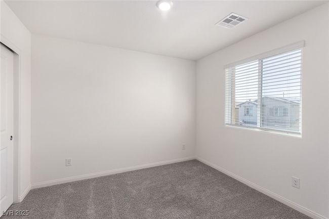 Empty room with baseboards, visible vents, and carpet floors | Image 19