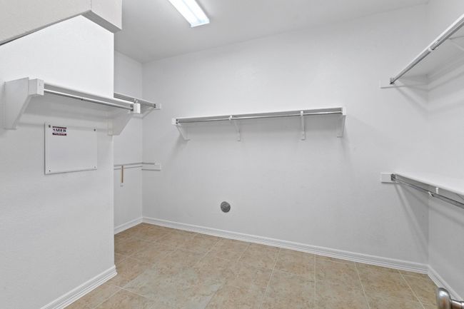 View of spacious closet | Image 25