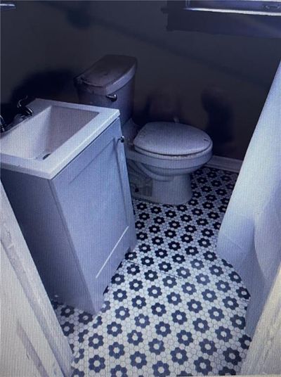 Bathroom featuring vanity and toilet | Image 3