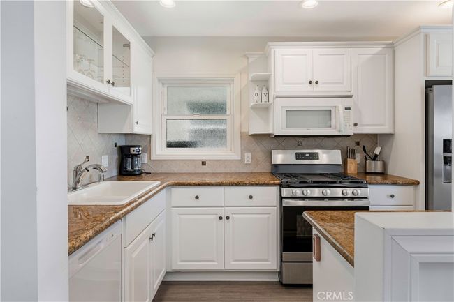 1003 Seal Way, Home with 6 bedrooms, 4 bathrooms and 2 parking in Seal Beach CA | Image 11
