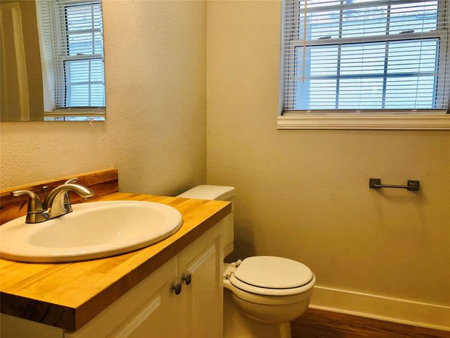 Bathroom featuring vanity and wood finished floors | Image 16