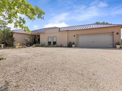 View of front facade with a garage | Image 3