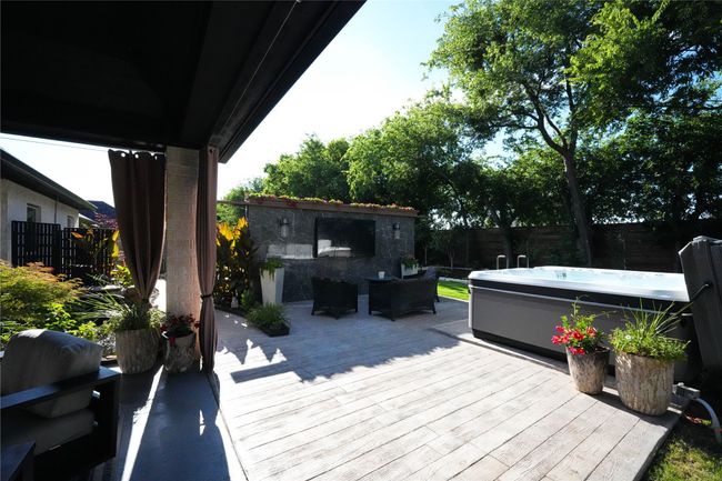 Day View TV Wall and hot tub | Image 34