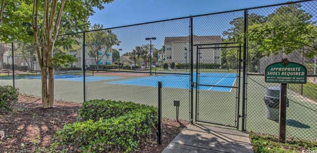 View of tennis court with a gate | Image 24