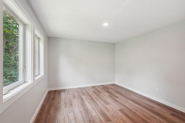 2nd fl room with wood finished floors and recessed lighting | Image 22