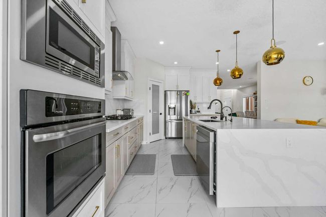 316 Kinniburgh Link, House other with 5 bedrooms, 4 bathrooms and 6 parking in Chestermere AB | Image 16