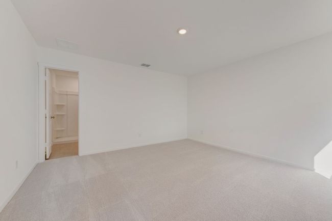 Spare room featuring light colored carpet and recessed lighting | Image 19