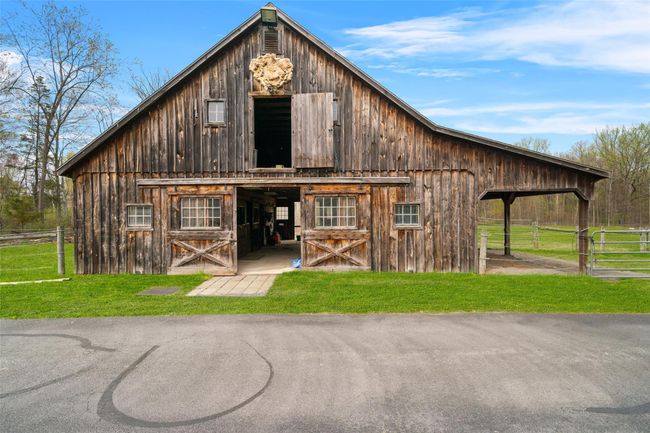 View of barn with a lawn and fence | Image 35