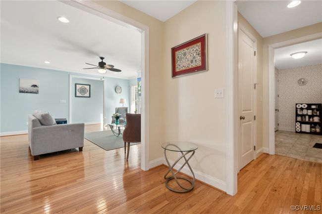 Center hall space. Garage entry is to the right along with a spacious laundry room/mud room, powder room, and large closet & media hookup. | Image 30