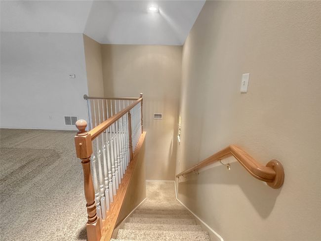 Stairs with carpet and baseboards | Image 18