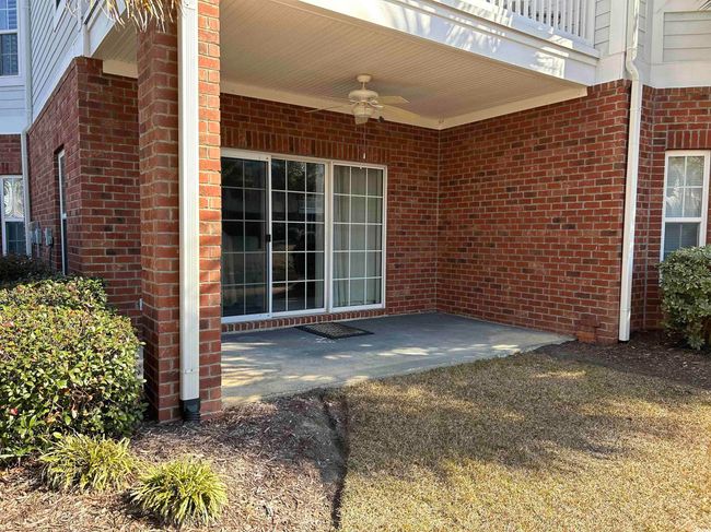 View of patio / terrace with a ceiling fan | Image 18