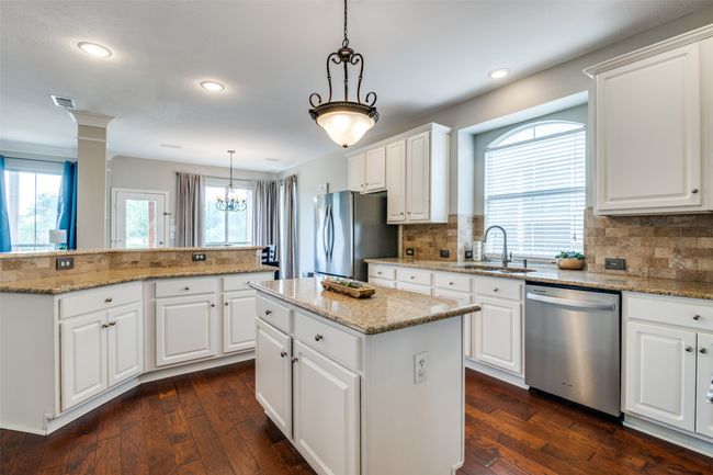 Plenty of cabinets for storage. | Image 13