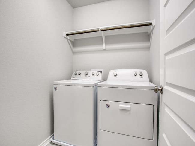 Laundry room with washing machine and dryer | Image 18