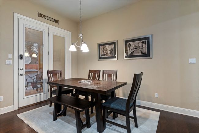 Dining Area in Kitchen Opens to Patio | Image 15