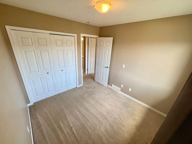 703 - 620 Luxstone Landing Sw, Townhouse with 3 bedrooms, 3 bathrooms and 2 parking in Airdrie AB | Image 21