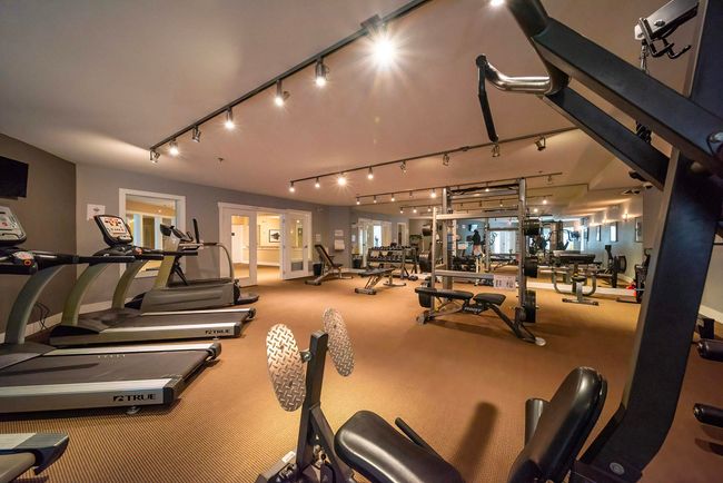Exercise room with baseboards | Image 33
