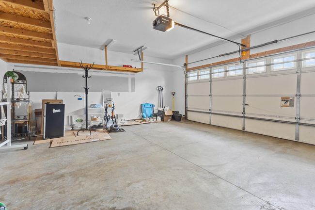 Nice sized 2 car garage with built in overhead storage | Image 26