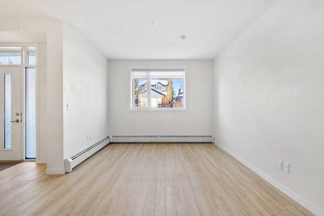 12 - 30 Shawnee Common Sw, Condo with 2 bedrooms, 3 bathrooms and 1 parking in Calgary AB | Image 4
