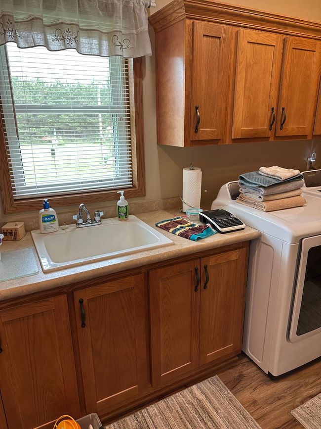 Laundry room with sink | Image 16