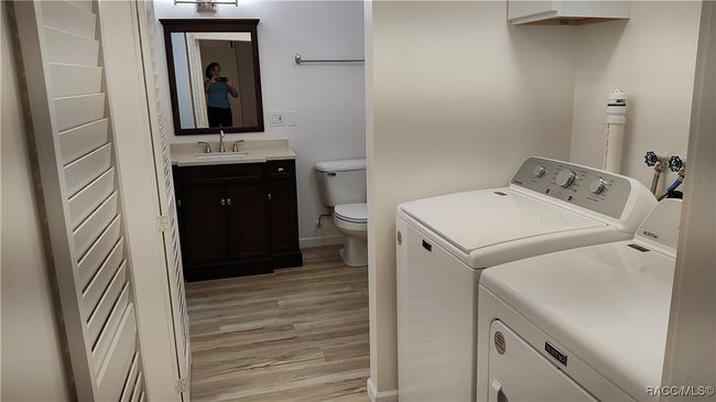 Laundry across from walk in closet | Image 17
