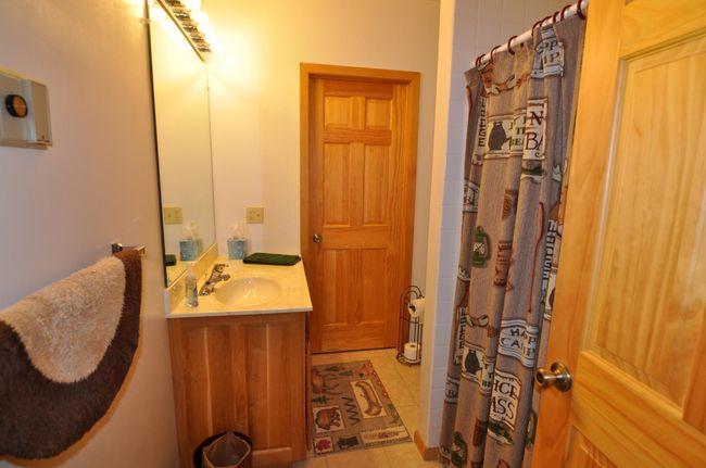 Lower level 3/4 bath, door leads to utility room | Image 47