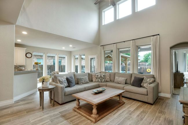 Picture windows allow for plenty of natural light to flood in. | Image 4