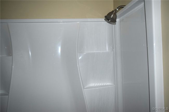 Bathroom view of a shower | Image 6