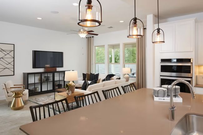Photo of Pulte model home with same floor plan, not of actual home listed. | Image 13